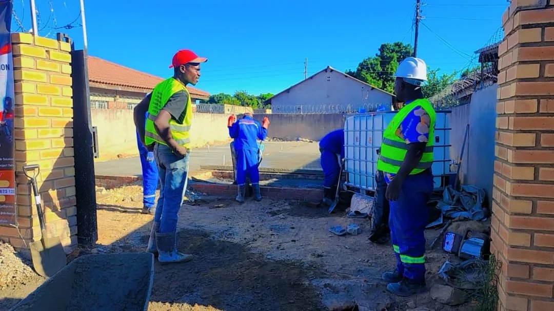 DC Designs and Construction team coordinating residential construction work